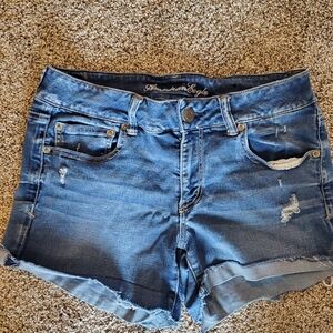 American Eagle  super stretch.  Sz 12 distressed. 4inseam